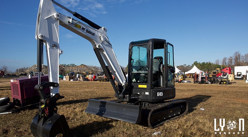 Why is buying used equipment from construction auctions a good investment?